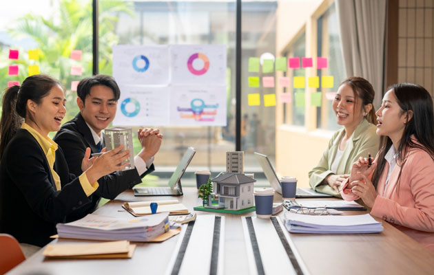 team reviewing real estate strategy